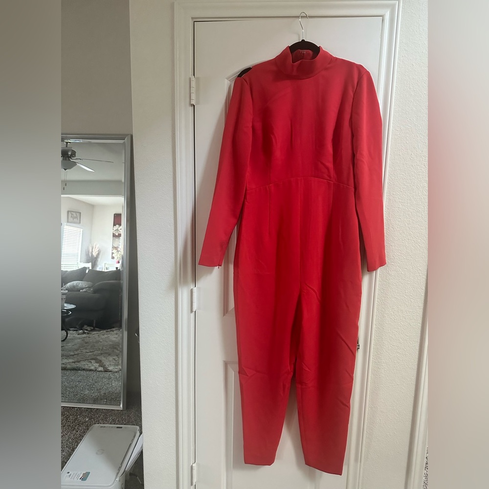 Bcbg pants jumpsuit with back cutouts.